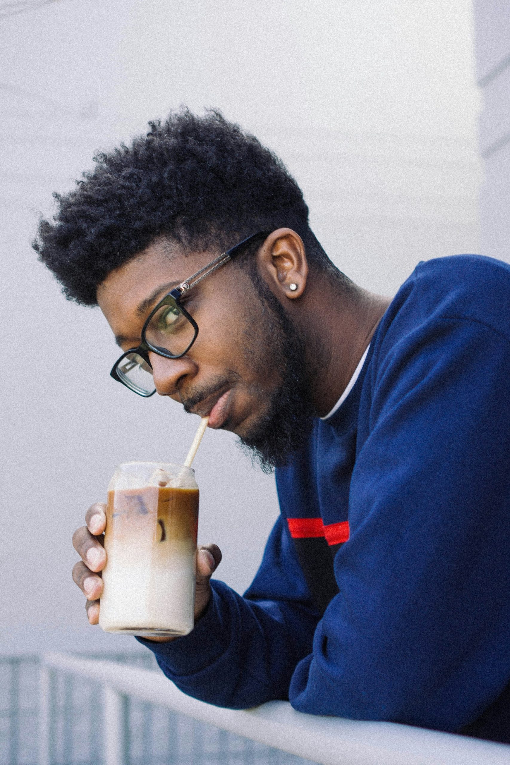 Man taking a mindful coffee break to recharge during a busy parenting day