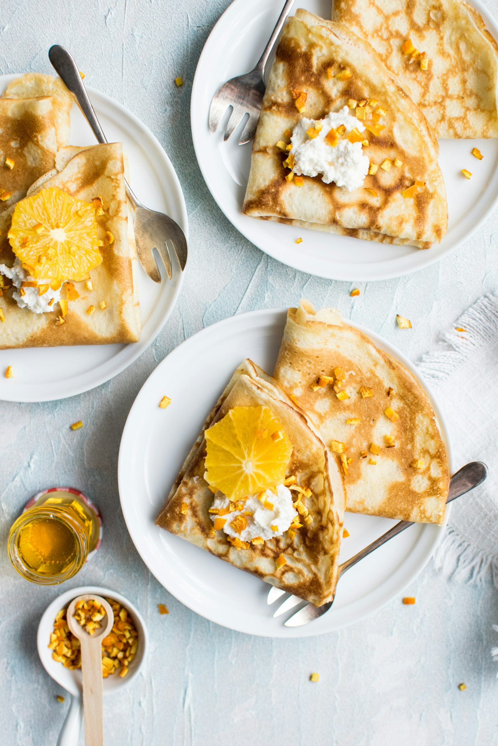 Freshly made crepe with powdered sugar and lemon, typical Parisian street food perfect for a quick snack during a city break in Paris